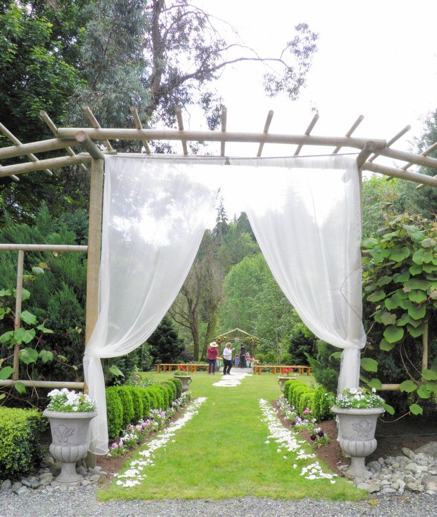 The bride walks through this archway and down the aisle here